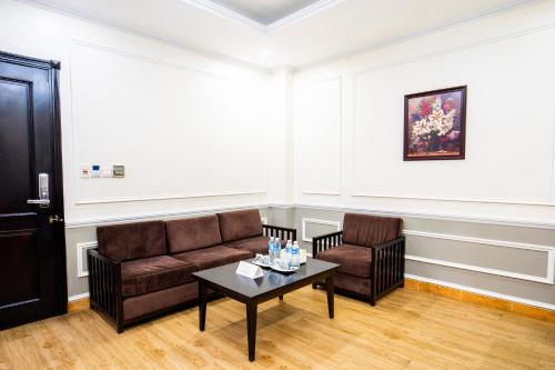 Χώρος καθιστικού στο MAY PLAZA HOTEL