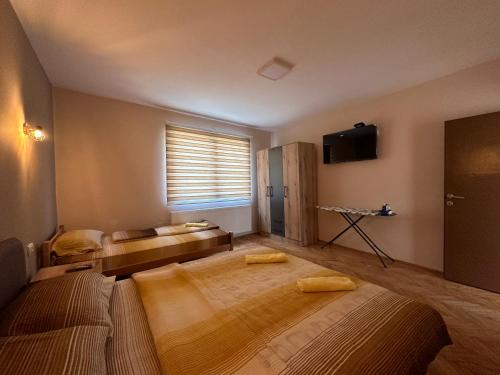 Postel nebo postele na pokoji v ubytování Apartman Pogled Arilje
