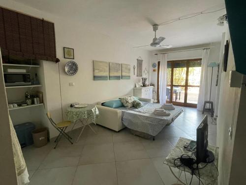 En eller flere senge i et værelse på Residence Calamaiore