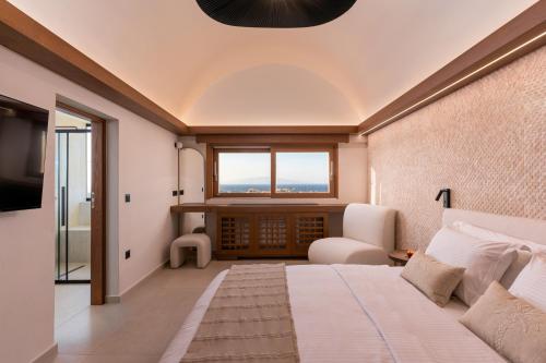 Ένα ή περισσότερα κρεβάτια σε δωμάτιο στο Fregata Luxury Villa