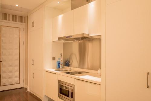 Η κουζίνα ή μικρή κουζίνα στο Xiamen Ocean View Suite - Xiamen University Twin Towers Branch