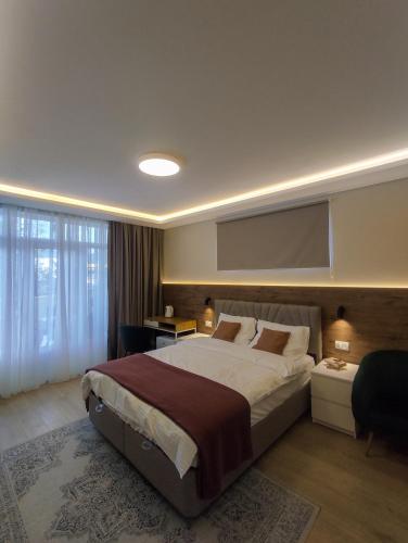 Postel nebo postele na pokoji v ubytování Pyrus Apartments