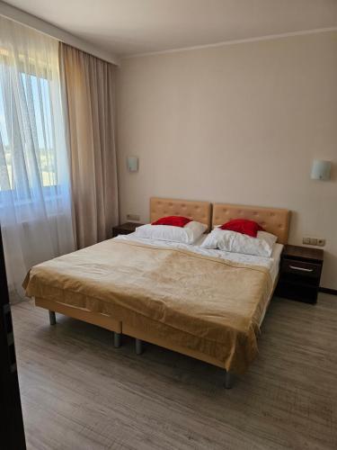 Postel nebo postele na pokoji v ubytování Dom Wczasowy Korona