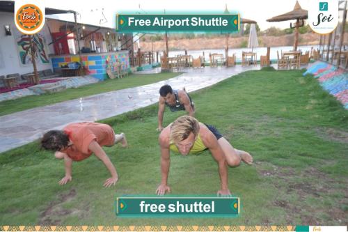 a group of three people at a water park at Fenti Nubian Resort in Aswan