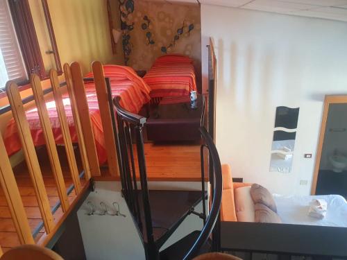 Posezení v ubytování Loft immerso nel bosco