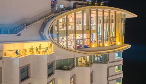 a building with a large glass dome on top of it at Havana Nha Trang Hotel in Nha Trang