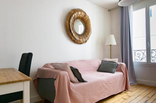 Ένα ή περισσότερα κρεβάτια σε δωμάτιο στο Séjour Élégance au pied du Chateau de Vincennes