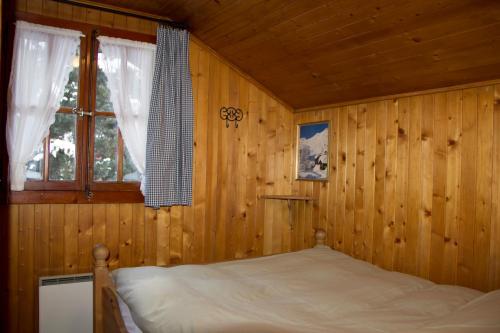 Postel nebo postele na pokoji v ubytování Chalet Le Camée