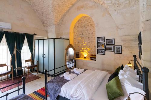 a bedroom with a bed in a room at Nomad inn in Sanlıurfa