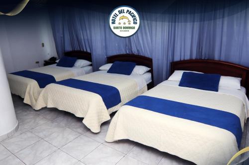 Postel nebo postele na pokoji v ubytování Hotel Del Pacifico