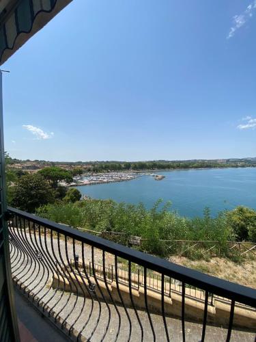 a view of a lake from a balcony at VANIA BLU Alloggio Turistico in Capodimonte