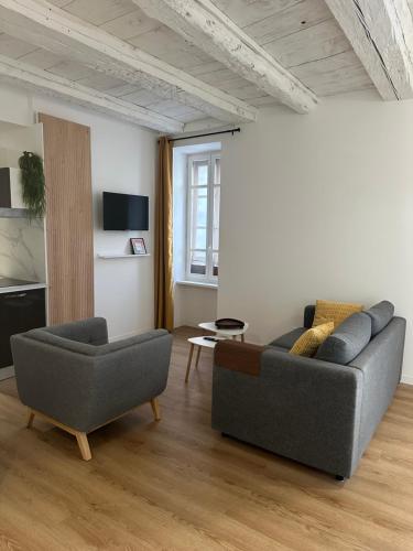 Μια τηλεόραση ή/και κέντρο ψυχαγωγίας στο Appartement Centre ville Besançon