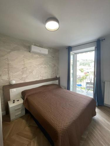 Ένα ή περισσότερα κρεβάτια σε δωμάτιο στο Residenza Marina