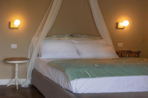 Katil atau katil-katil dalam bilik di Luce Boutique Hotel