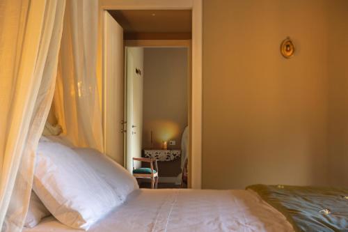 Katil atau katil-katil dalam bilik di Luce Boutique Hotel