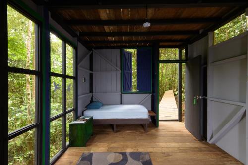 Postel nebo postele na pokoji v ubytování Yatama Rainforest Ecolodge