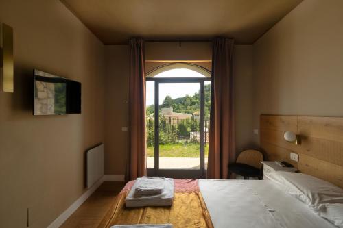Postel nebo postele na pokoji v ubytování Luce Boutique Hotel