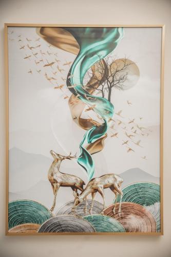 a painting of a group of animals and birds at Qadim Hotel in Samarkand