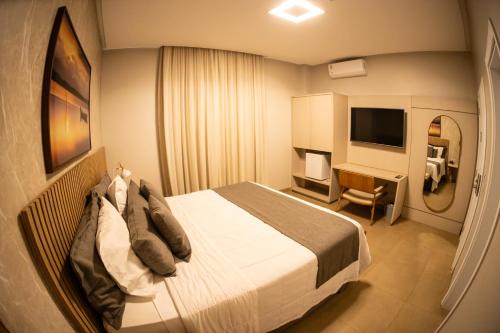 Cama o camas de una habitación en Brii Hotel