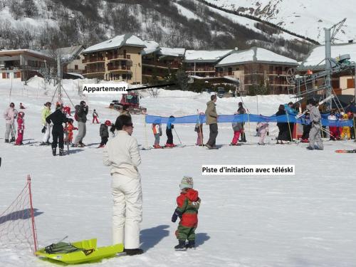 a group of people standing in the snow at VALLOIRE - Les Verneys - Thymel in Valloire
