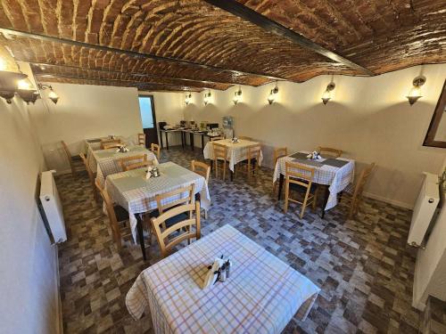 an overhead view of a restaurant with tables and chairs at Turmhaus Hermannstadt in Sibiu