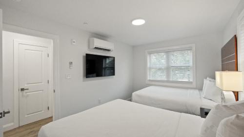 Ένα ή περισσότερα κρεβάτια σε δωμάτιο στο Safari Apartments