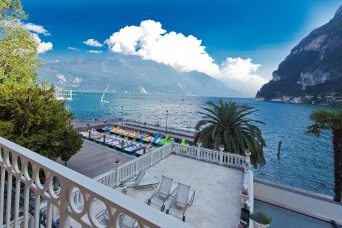 a balcony with a view of a body of water at Bellavista Lakefront in Riva del Garda