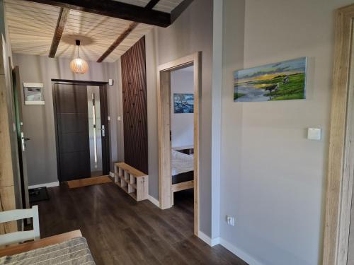 Fotografie z fotogalerie ubytování Apartament Sosny 2,3 nad jeziorem OTW Borówno Wielkie v destinaci Skarszewy