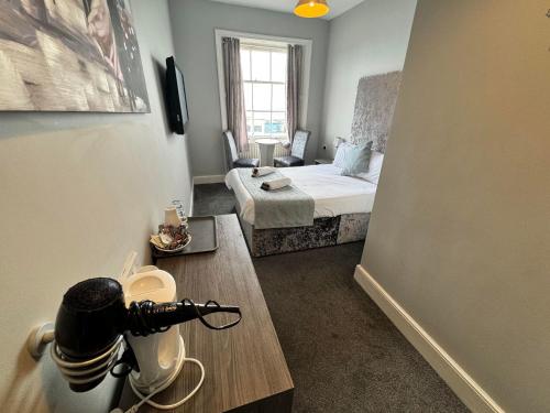 The Jubilee Hotel West- with NEWLY REFURBISHED SPA FACILITIES - GAMESPIT - AND SMOKEHOUSEにあるベッド