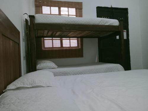 Cama o camas de una habitación en Villa Candelaria Hostel