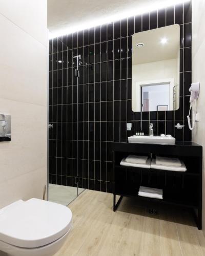Koupelna v ubytování HVOYA Apart-Hotel & SPA