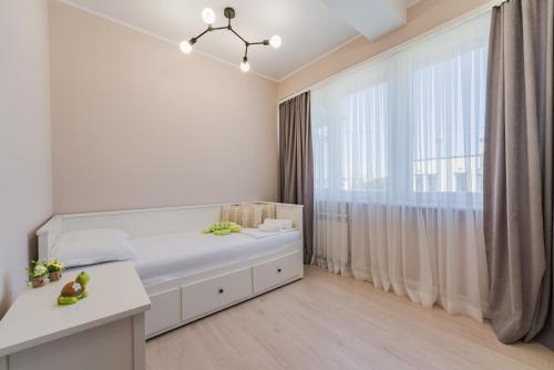 Postel nebo postele na pokoji v ubytování Luxury Seaside Apartment