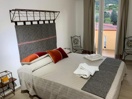Ένα ή περισσότερα κρεβάτια σε δωμάτιο στο Relais del poggio