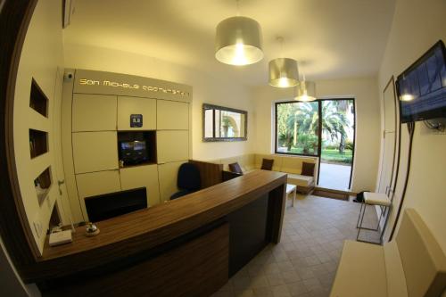 an office with a reception desk and a waiting room at San Michele Apartments&Rooms in Catanzaro