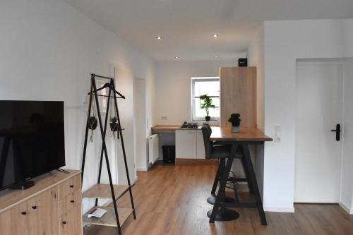 Μια τηλεόραση ή/και κέντρο ψυχαγωγίας στο Apartment Grone 2