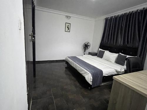 Fotografie z fotogalerie ubytování House 17 Apartment And Services Ltd v destinaci Boi