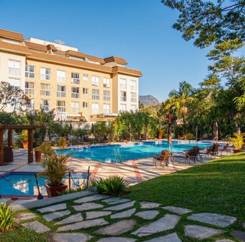 Bazén v ubytování Itaipava RJ Granja Brasil Resort nebo v jeho okolí