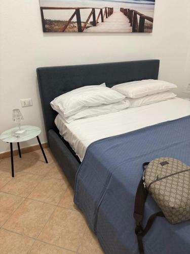 Postel nebo postele na pokoji v ubytování The Apartments Tropea