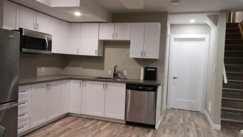 Η κουζίνα ή μικρή κουζίνα στο Boardwalk Homes - Executive Guest Rooms & Townhomes