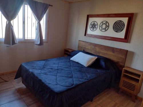 Postel nebo postele na pokoji v ubytování Portal del Sol