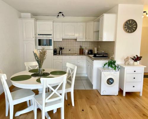 Kuchyň nebo kuchyňský kout v ubytování Appartement de charme