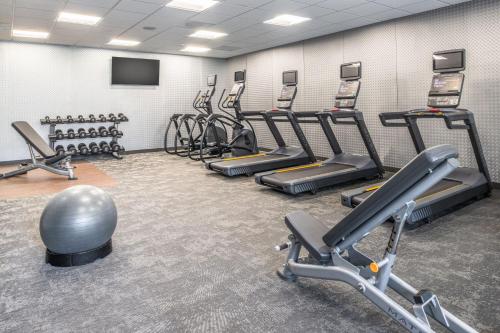 a gym with a bunch of treadms and cardio machines at Fairfield by Marriott Issaquah in Issaquah