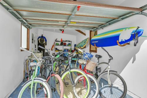 a group of bikes parked in a garage at Historic Spanish Home at Hollywood Beach in Oxnard