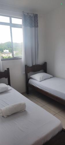 Postel nebo postele na pokoji v ubytování Excelente apartamento em Lauro de Freitas
