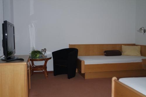 Ein Bett oder Betten in einem Zimmer der Unterkunft Apart Alina