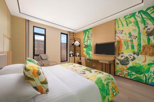 Μια τηλεόραση ή/και κέντρο ψυχαγωγίας στο Courtyard by Marriott Shanghai International Tourism and Resorts Zone