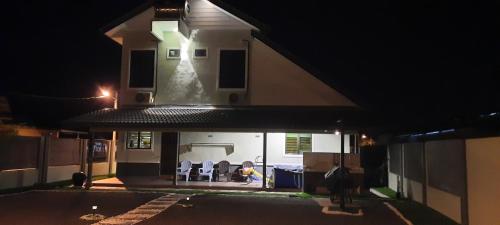 a view of a house at night at Chatak Hill Residence in Dungun