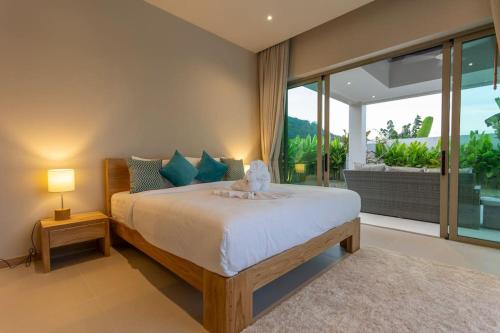 Ένα ή περισσότερα κρεβάτια σε δωμάτιο στο Brand New Completed v124