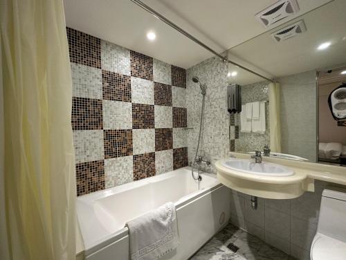 Un baño de Link World Hotel