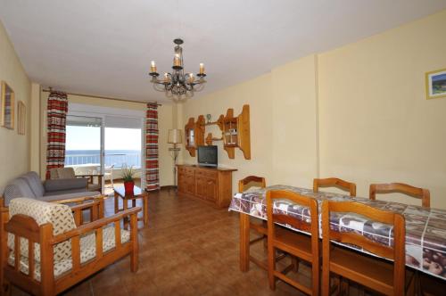 Χώρος καθιστικού στο Apartamentos Tao